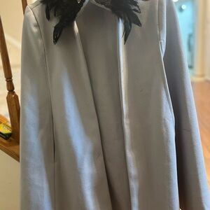 Chic Women's Gray Cape with Black Feather Accent